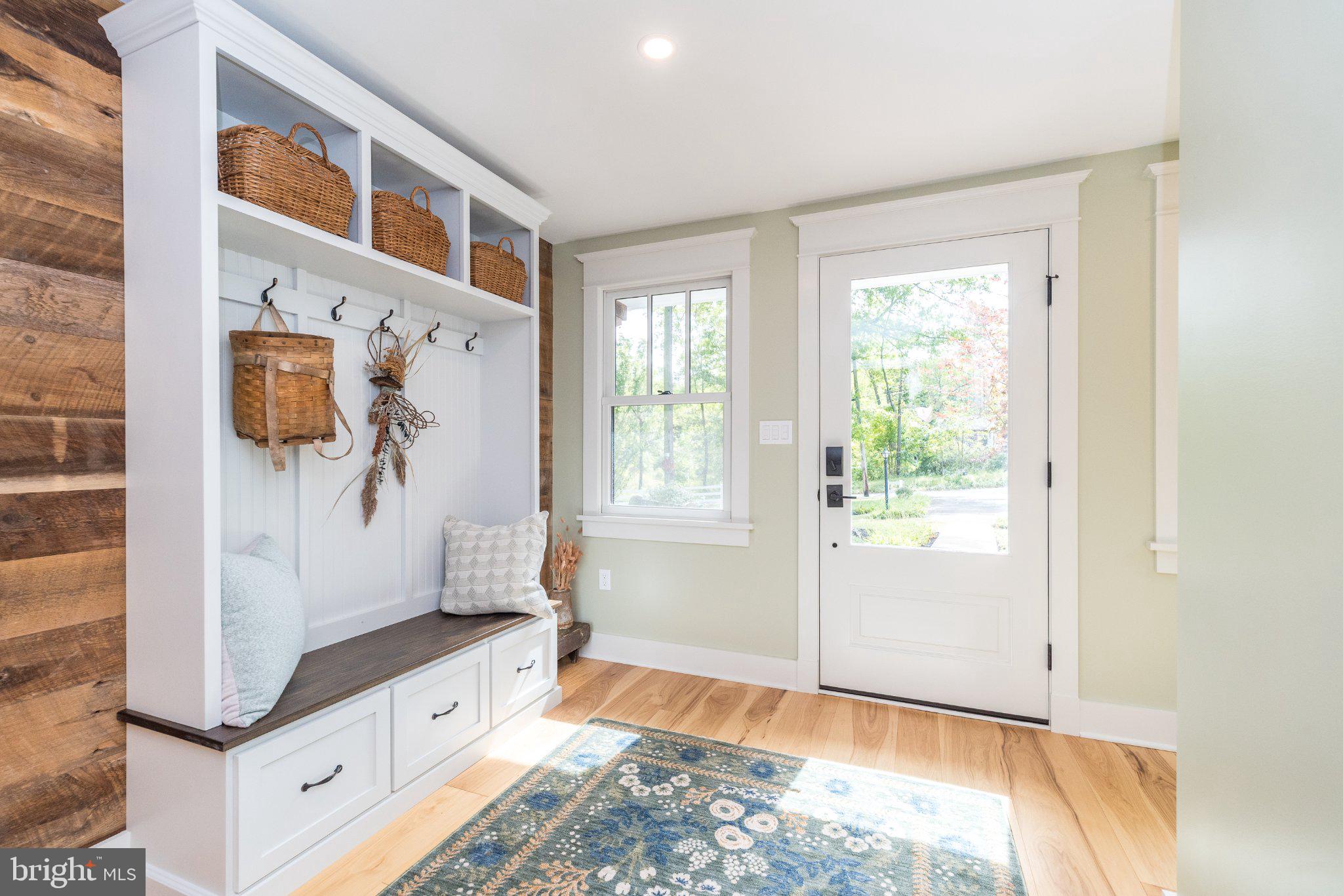 Inviting Entry with Custom Built-In Bench