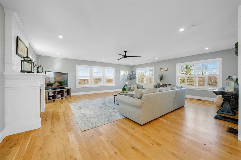 62 Seven Sister Road Haverhill, MA 01830 - Photo 20 of 42 a living room with furniture and a wooden floor