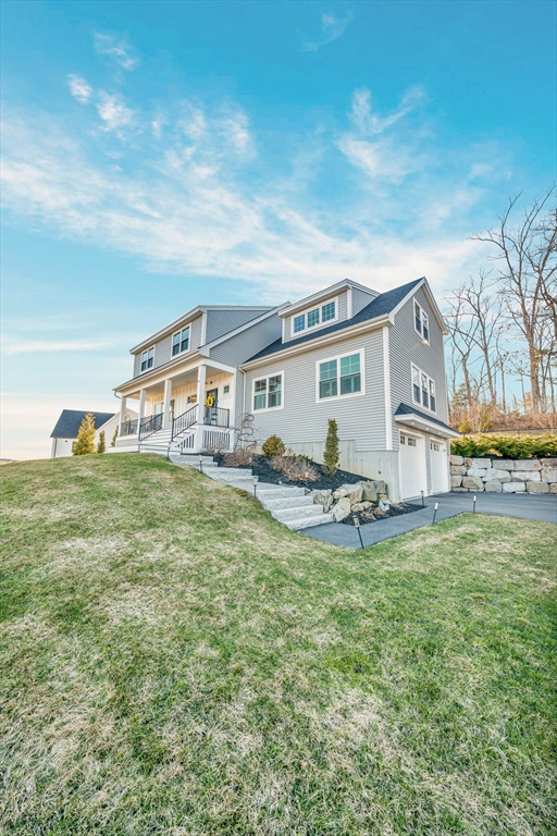 62 Seven Sister Road Haverhill, MA 01830 - Photo 42 of 42 a view of a house with a big yard and large trees