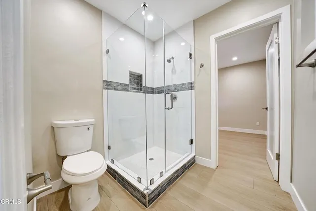 a bathroom with a double vanity sink and mirror