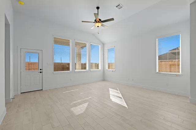 a view of a livingroom with a kitchen