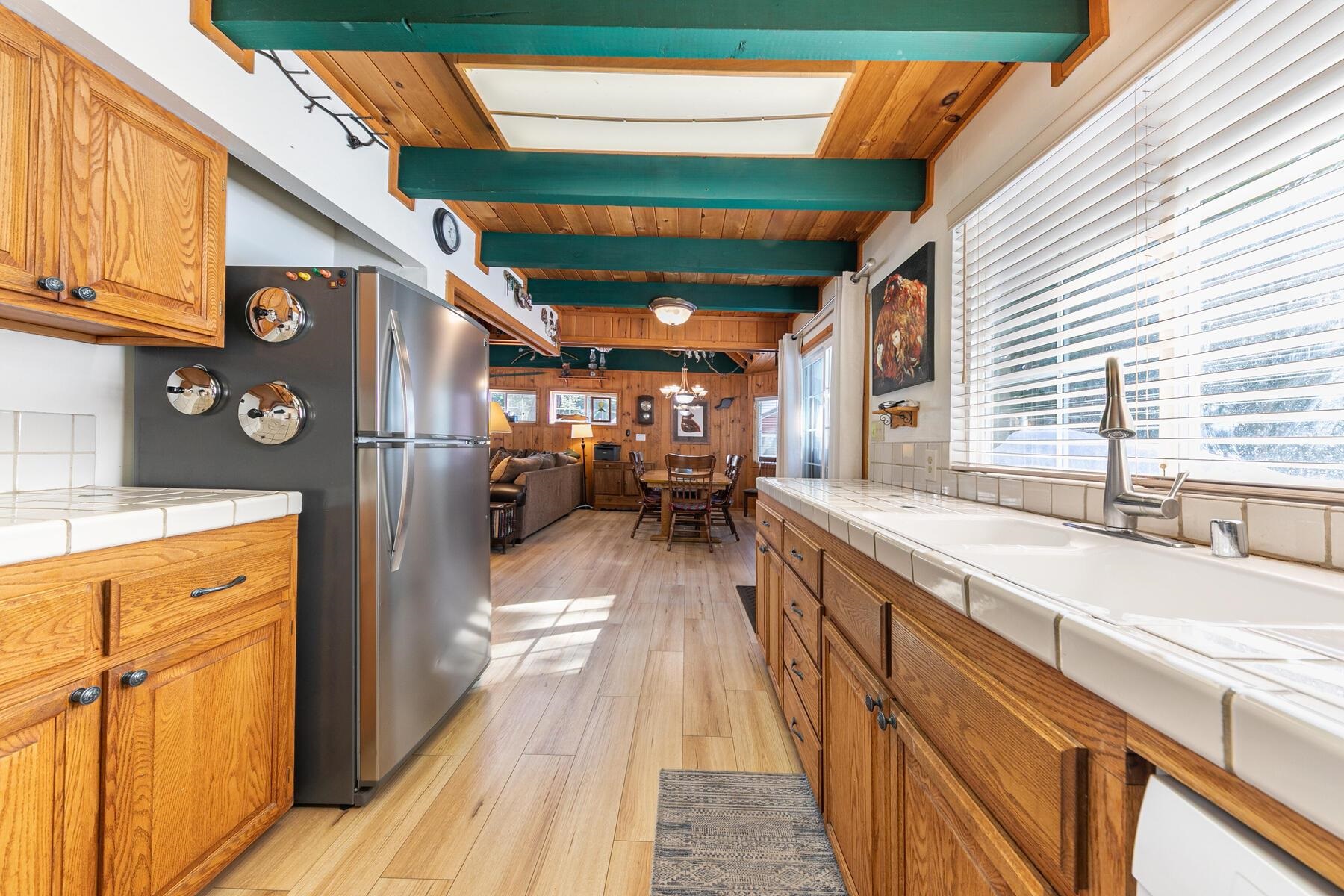 5749 Dodowah Road Carnelian Bay, CA 96140 - Photo 12 of 28 a view of a kitchen with a large window