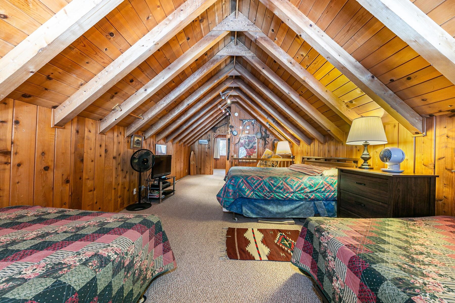 5749 Dodowah Road Carnelian Bay, CA 96140 - Photo 18 of 28 a bedroom with bed and balcony