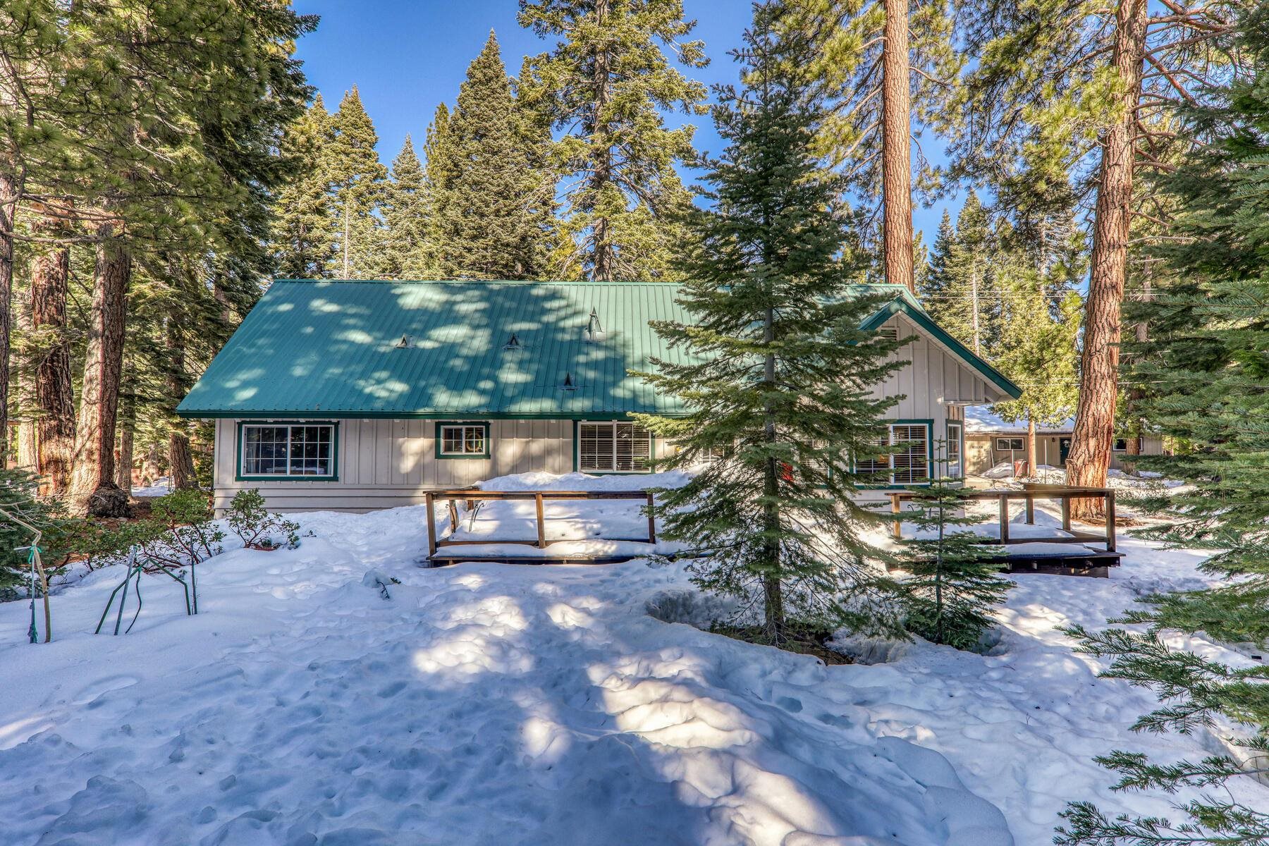5749 Dodowah Road Carnelian Bay, CA 96140 - Photo 22 of 28 a front view of a house with garden