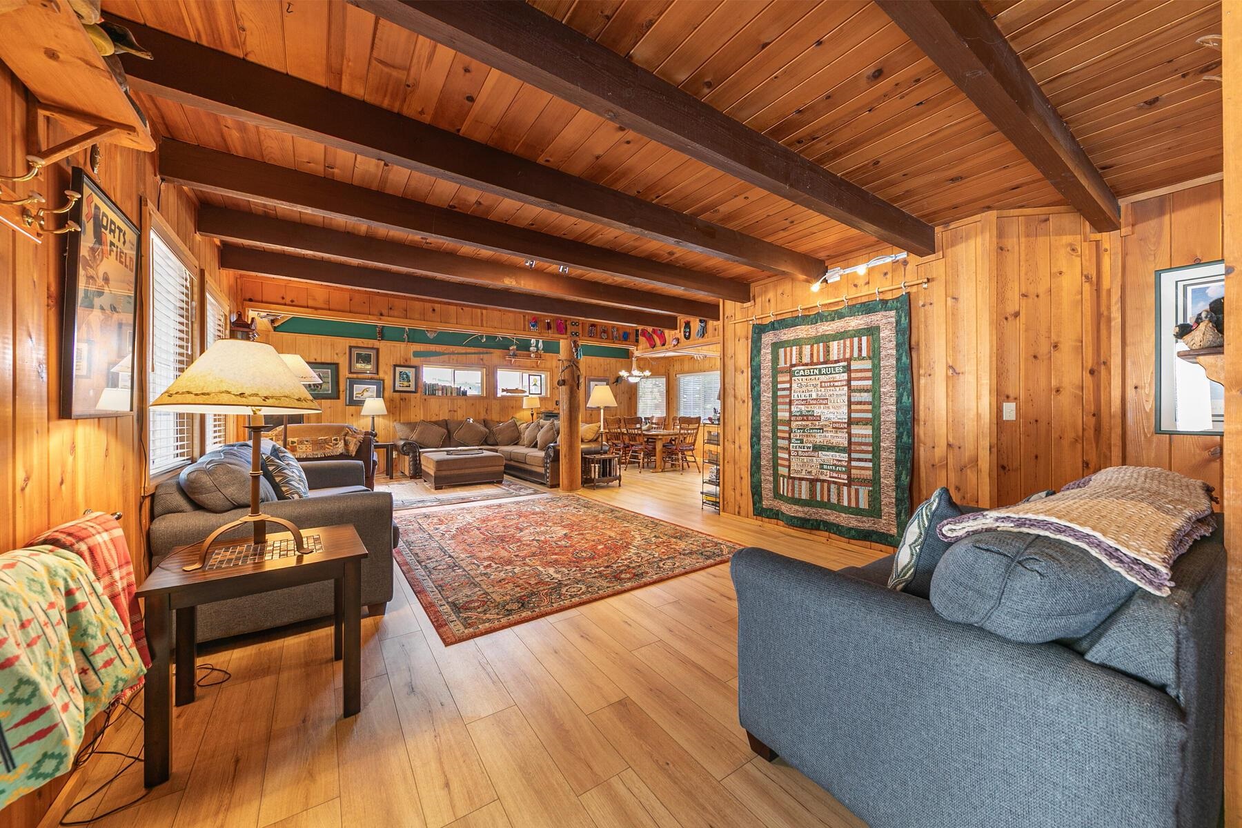 5749 Dodowah Road Carnelian Bay, CA 96140 - Photo 3 of 28 a bedroom with furniture and a large window