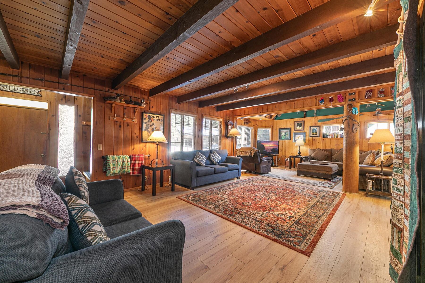 5749 Dodowah Road Carnelian Bay, CA 96140 - Photo 4 of 28 a living room with furniture and wooden floor