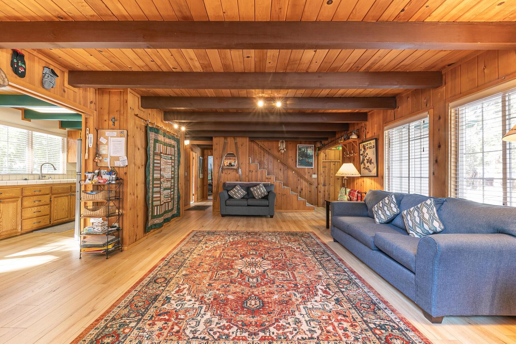 5749 Dodowah Road Carnelian Bay, CA 96140 - Photo 5 of 28 a living room with furniture and a rug