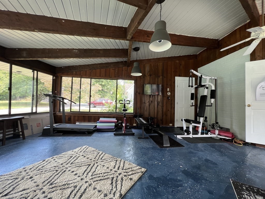 12 State Road, Unit 2E Plymouth, MA 02360 - Photo 27 of 28 a living room with patio furniture and a large window