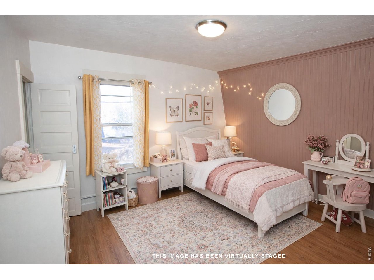 301 South 2nd Street Sterling, CO 80751 - Photo 25 of 49 a bedroom with a bed and a window