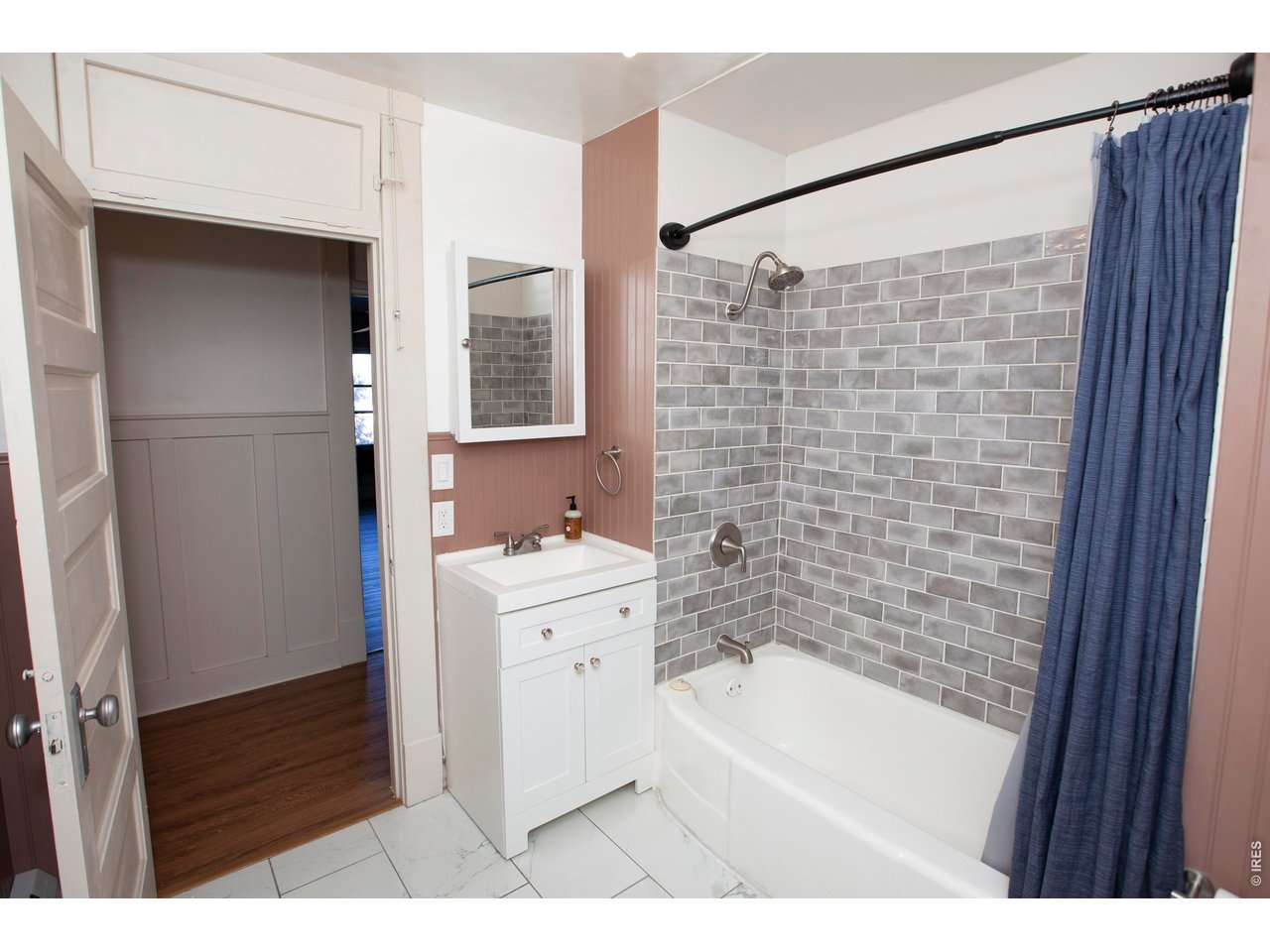 301 South 2nd Street Sterling, CO 80751 - Photo 30 of 49 Upstairs Full Bathroom w/storage closet