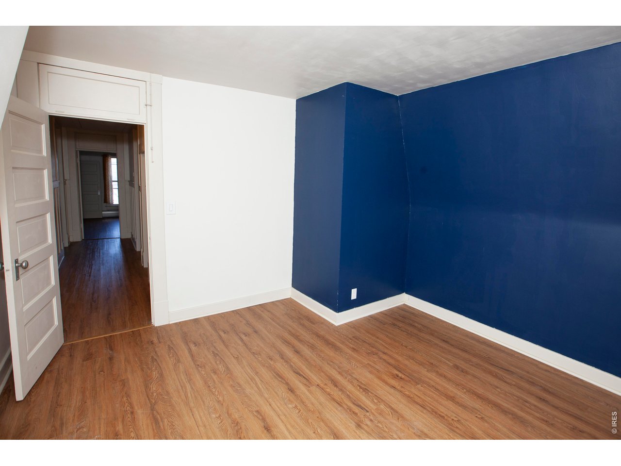 301 South 2nd Street Sterling, CO 80751 - Photo 34 of 49 a view of an empty room with wooden floor