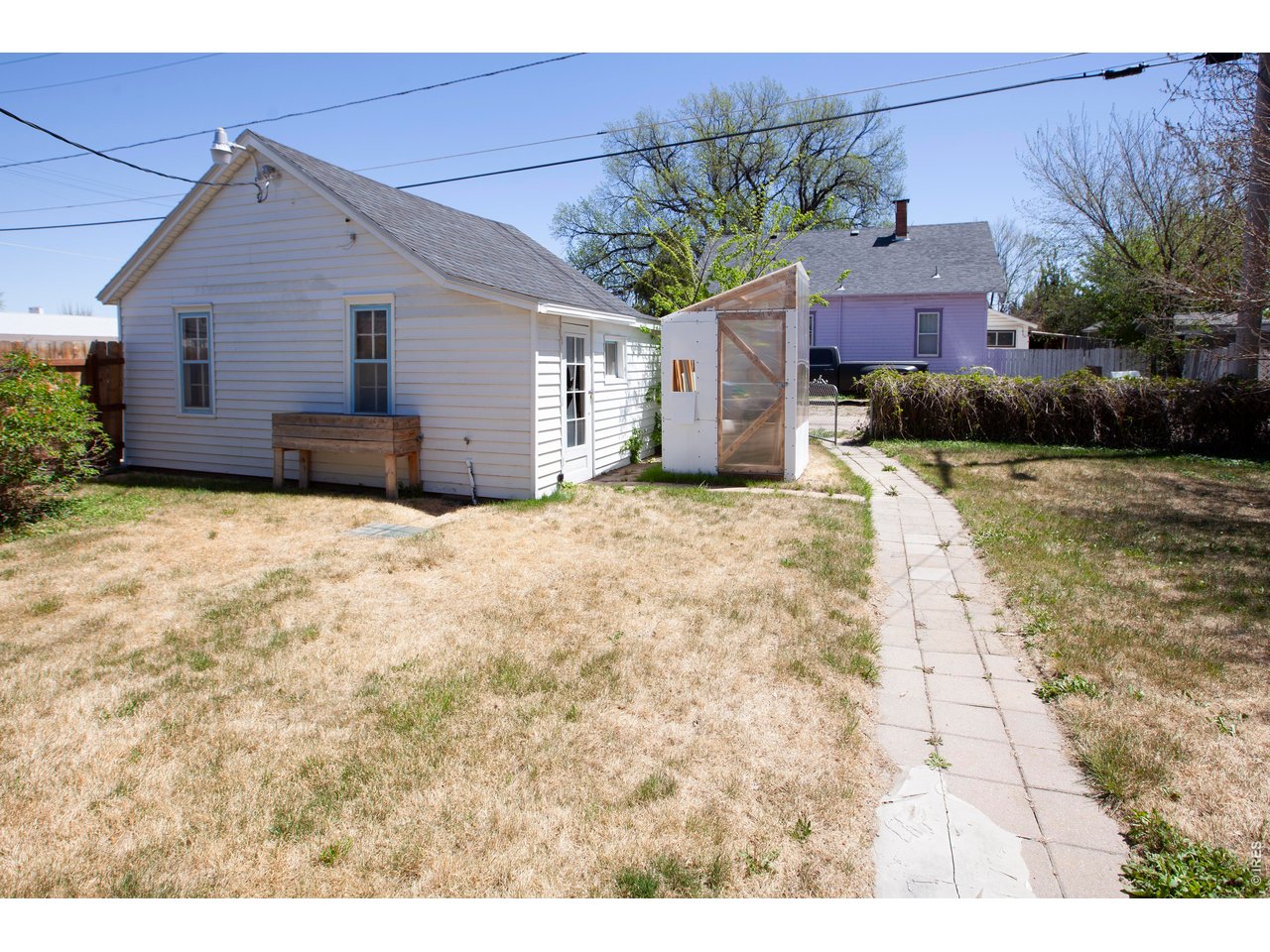 301 South 2nd Street Sterling, CO 80751 - Photo 45 of 49 a view of a house with a patio