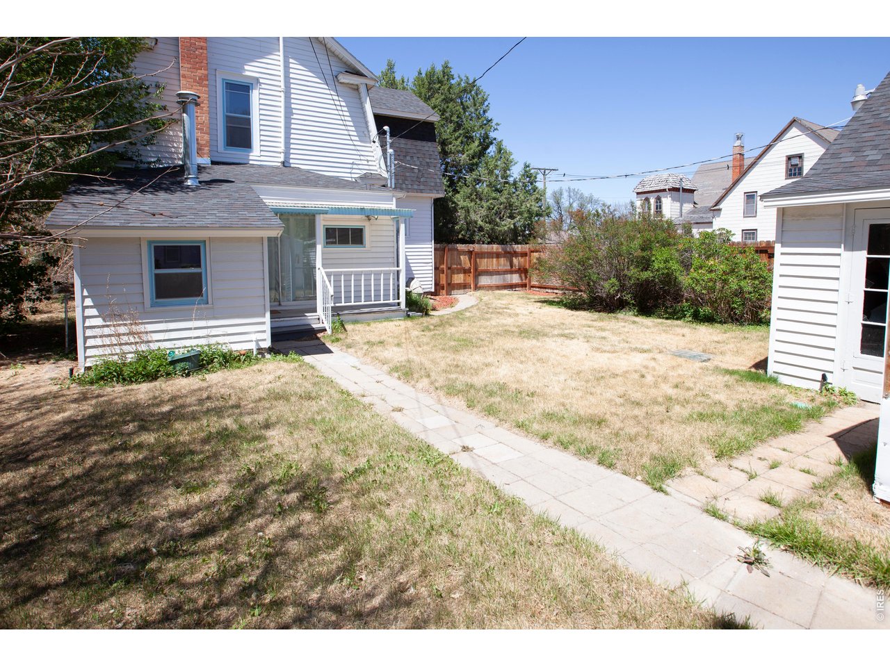 301 South 2nd Street Sterling, CO 80751 - Photo 48 of 49 a view of a house with a patio
