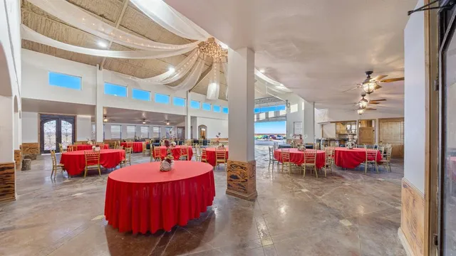 a view of a room with furniture window and wooden floor