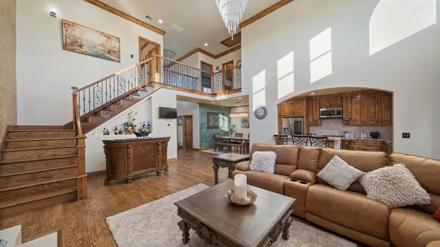 a kitchen with stainless steel appliances granite countertop a stove and a refrigerator