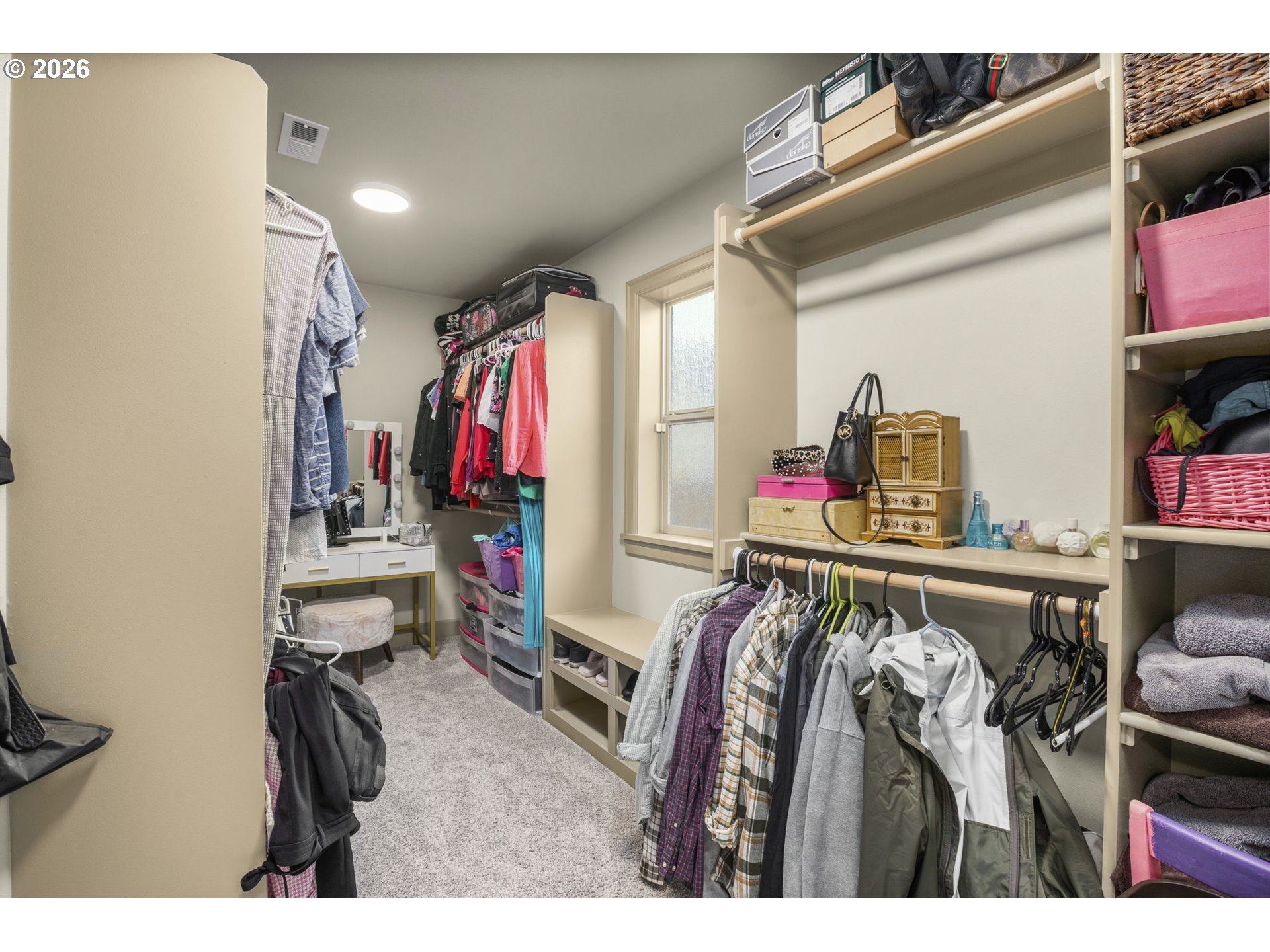 1668 Southeast 35th Terrace Gresham, OR 97080 - Photo 17 of 33 a view of walk in closet with clothes and shoes