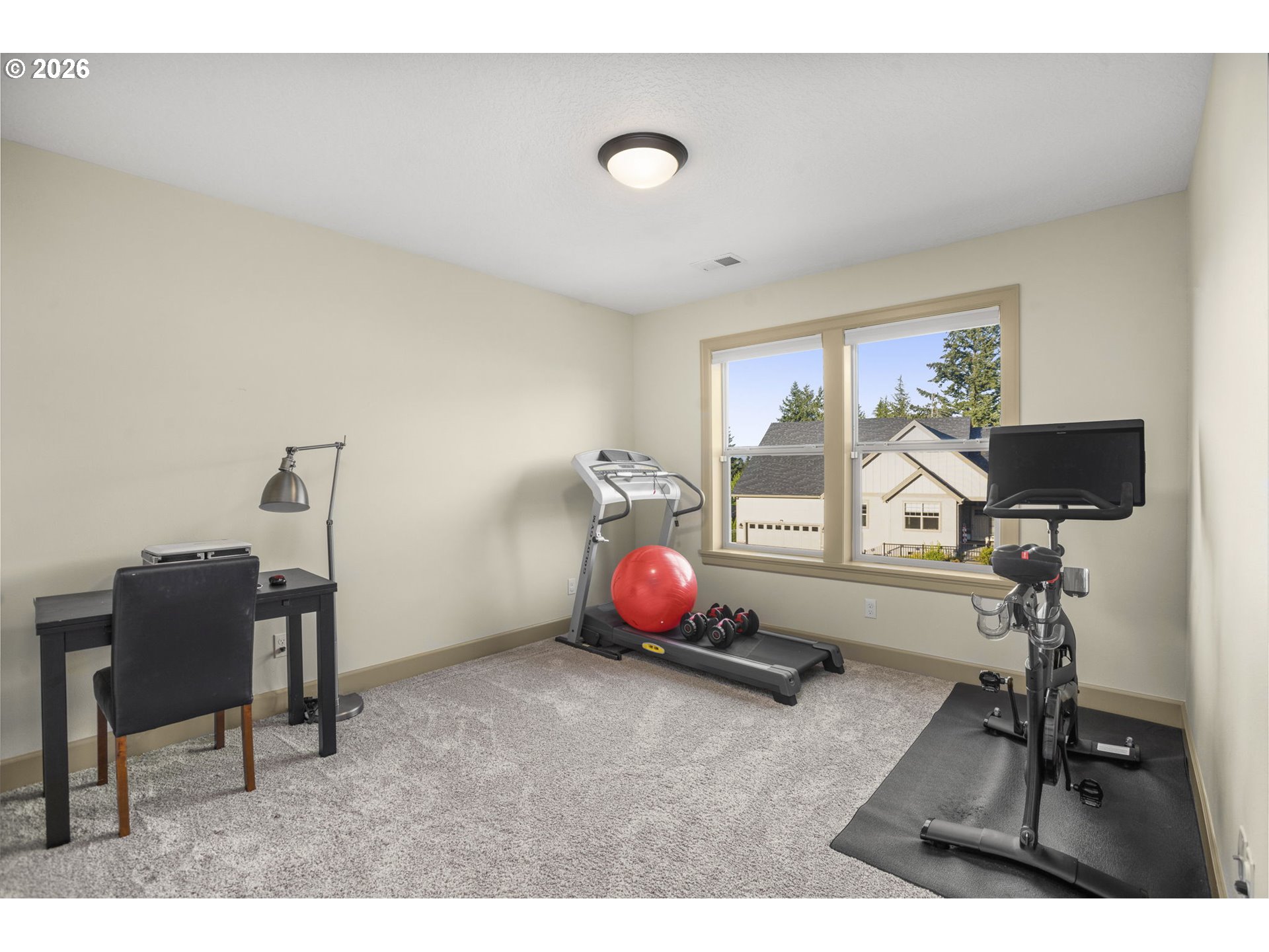 1668 Southeast 35th Terrace Gresham, OR 97080 - Photo 22 of 33 a living room with furniture and a flat screen tv