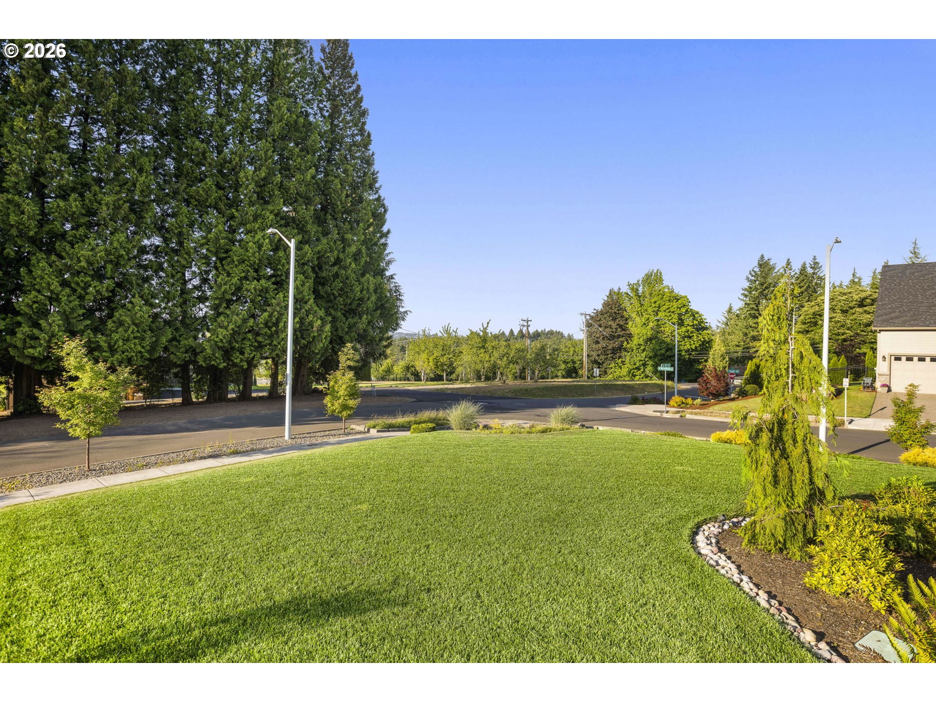 1668 Southeast 35th Terrace Gresham, OR 97080 - Photo 27 of 33 a swimming pool with trees in the background
