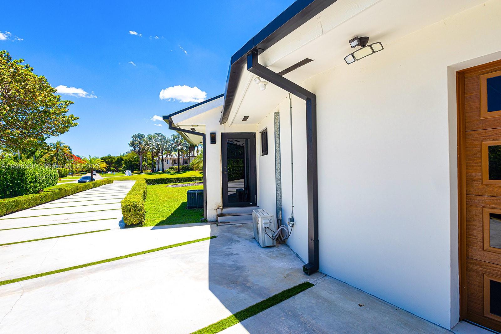10506 Southwest 89th Place Miami, FL 33176 - Photo 11 of 51 a view of swimming pool with seating space