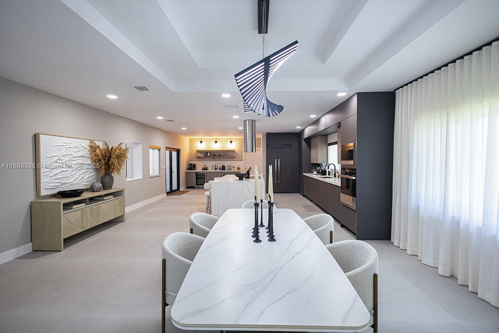 10506 Southwest 89th Place Miami, FL 33176 - Photo 13 of 51 a living room with furniture and a flat screen tv