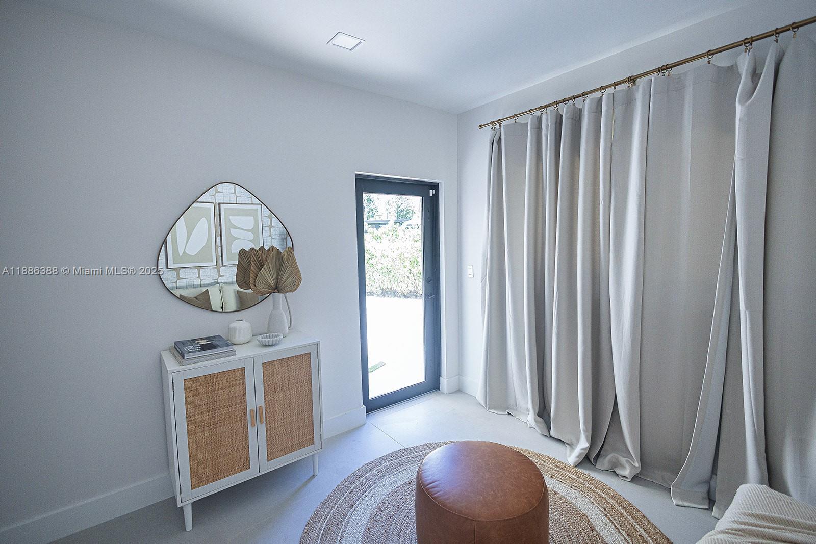 10506 Southwest 89th Place Miami, FL 33176 - Photo 20 of 51 a front view of a house with wooden floor