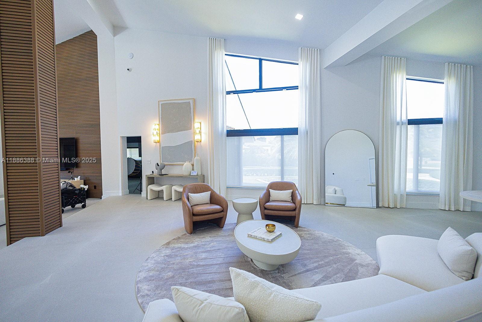 10506 Southwest 89th Place Miami, FL 33176 - Photo 31 of 51 a living room with furniture and a large window