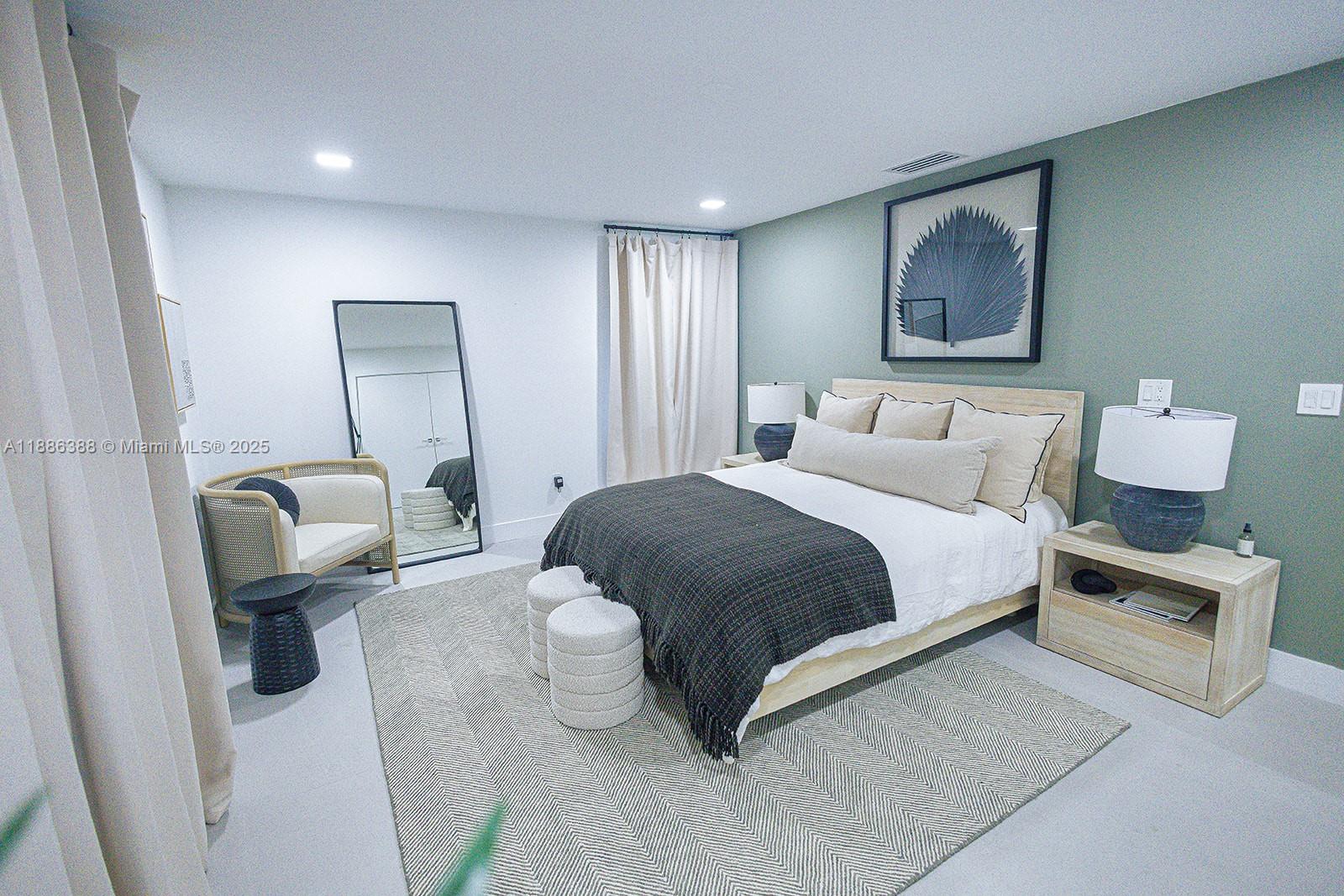 10506 Southwest 89th Place Miami, FL 33176 - Photo 32 of 51 a bedroom with a bed and furniture