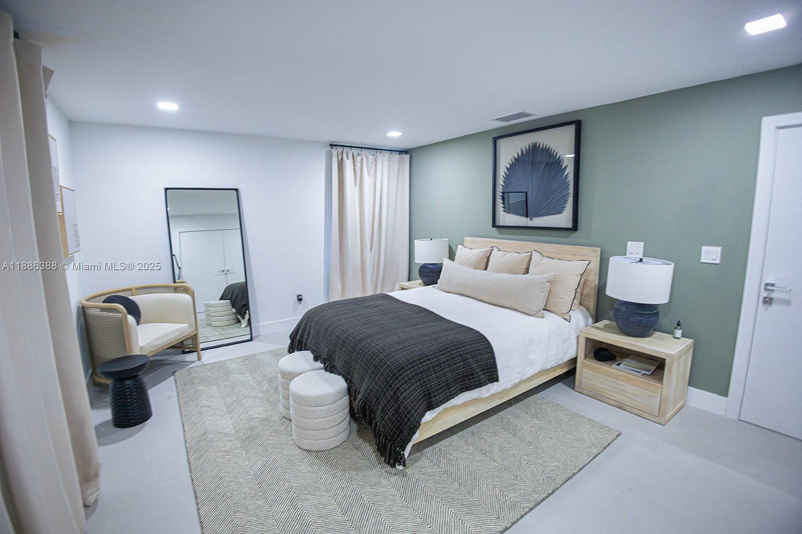 10506 Southwest 89th Place Miami, FL 33176 - Photo 33 of 51 a bedroom with a bed and a painting on the wall