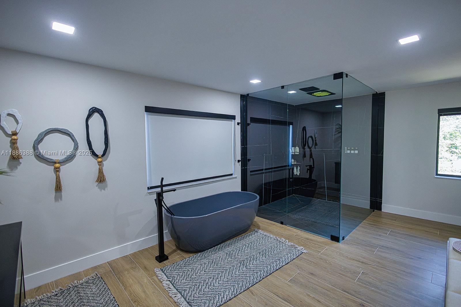 10506 Southwest 89th Place Miami, FL 33176 - Photo 43 of 51 a view of a room with wooden floor and furniture