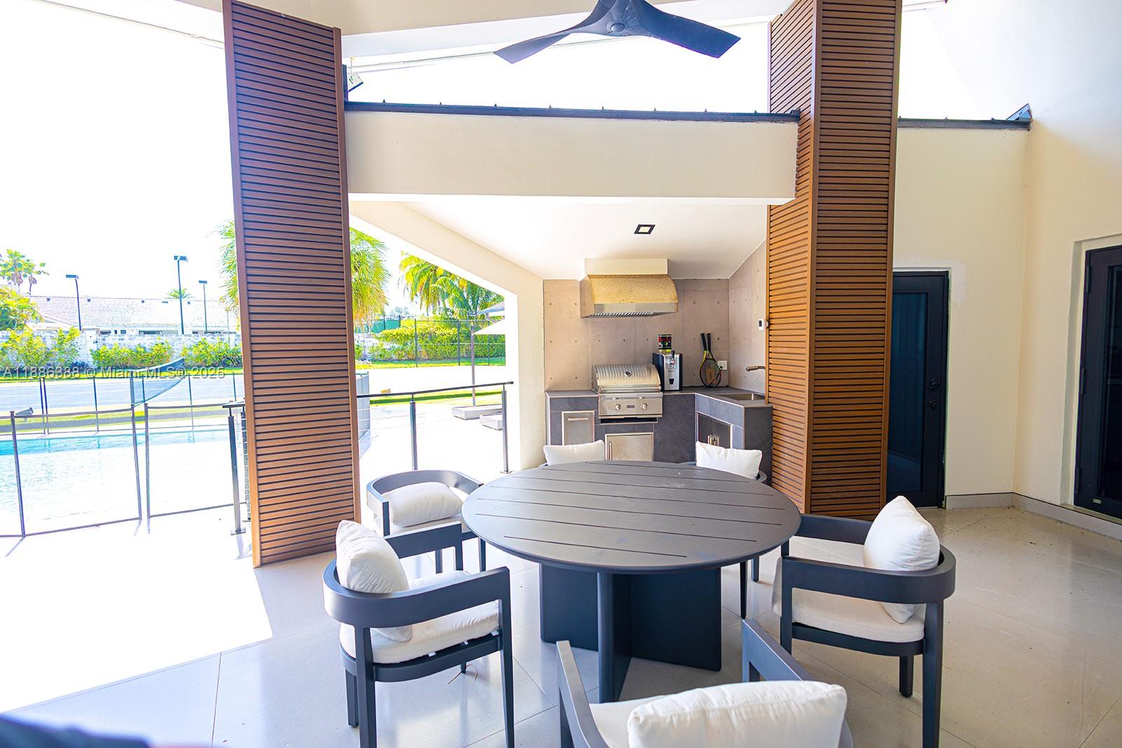 10506 Southwest 89th Place Miami, FL 33176 - Photo 44 of 51 a view of a dining room with furniture and wooden floor