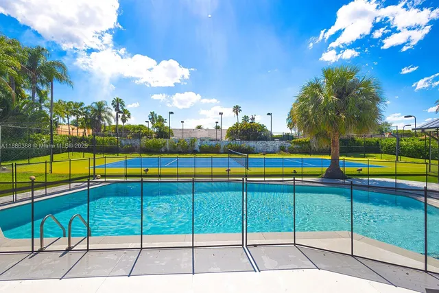 a wooden bench sitting in the middle of a building