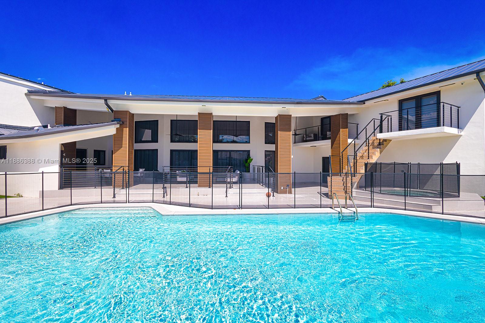 10506 Southwest 89th Place Miami, FL 33176 - Photo 49 of 51 a view of house with a backyard porch and sitting area