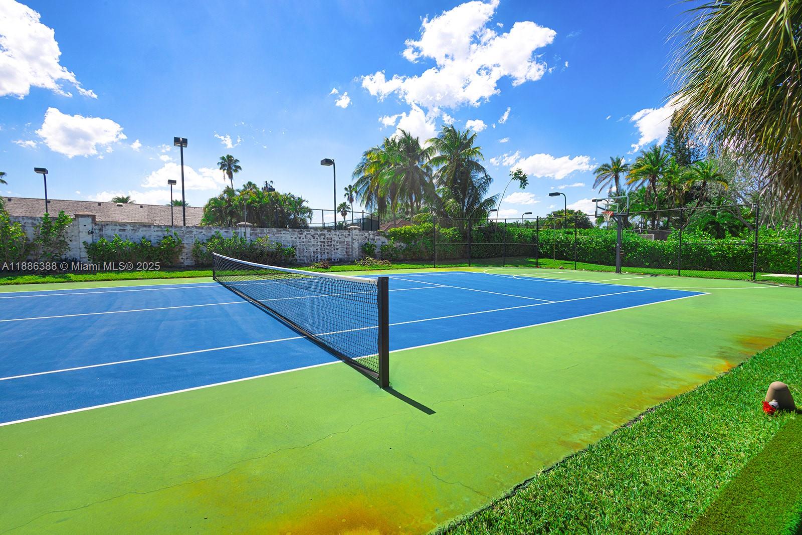 10506 Southwest 89th Place Miami, FL 33176 - Photo 50 of 51 a view of a tennis court