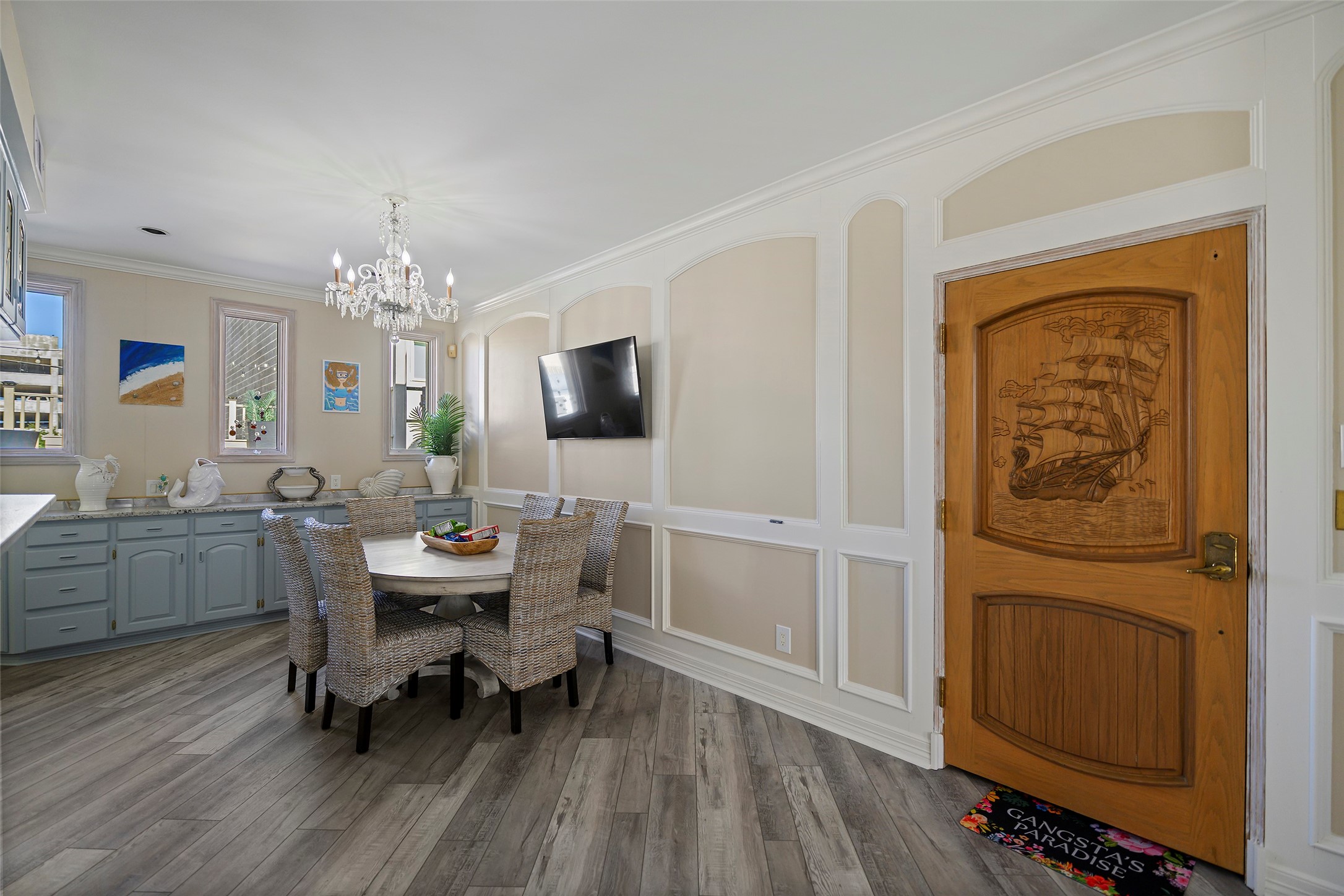 2102 Postoffice Street, Unit 1 Galveston, TX 77550 - Photo 18 of 38 Dining room. Wooden door is for the private elevator into the garage