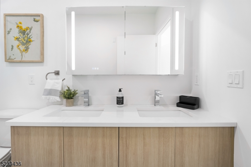 803 South Avenue, Unit 510 Plainfield, NJ 07062 - Photo 28 of 47 a kitchen with a sink and cabinets