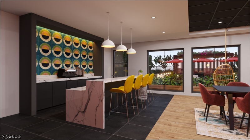 803 South Avenue, Unit 510 Plainfield, NJ 07062 - Photo 37 of 47 a view of a dining room with furniture and chandelier