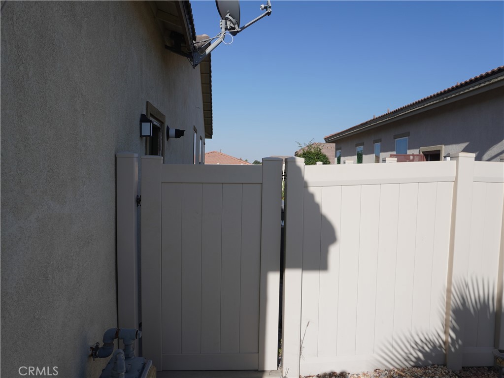 348 Scarlett Runner Beaumont, CA 92223 - Photo 16 of 33 a utility room with dryer and washer
