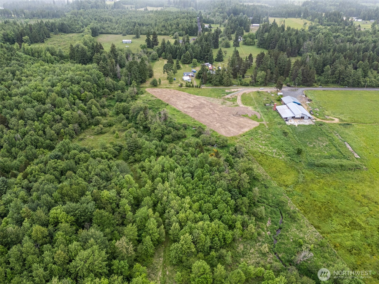 233 Allison Road Ethel, WA 98542 - Photo 13 of 20 an aerial view of residential houses with outdoor space and trees