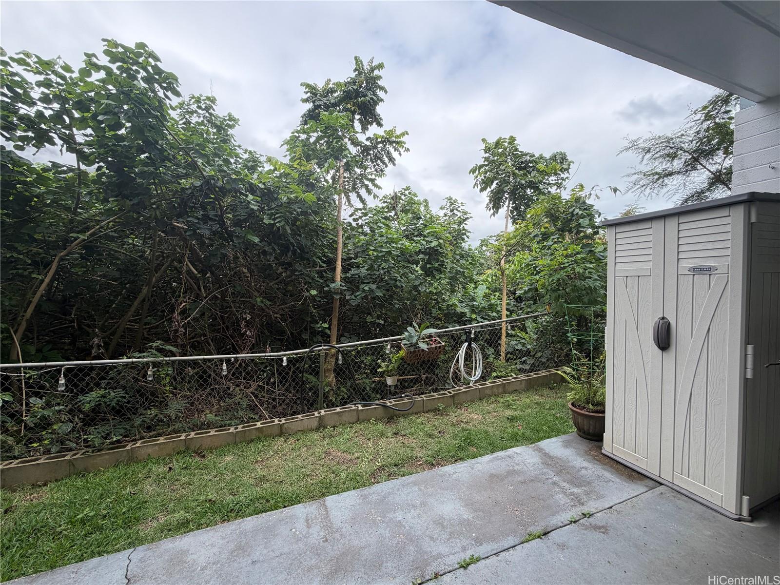 45-535 Luluku Road, Unit G1 Kaneohe, HI 96744 - Photo 12 of 15 a backyard of a house with lots of green space