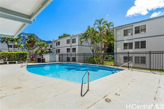 45-535 Luluku Road, Unit G1 Kaneohe, HI 96744 - Photo 13 of 15 a view of a patio with swimming pool