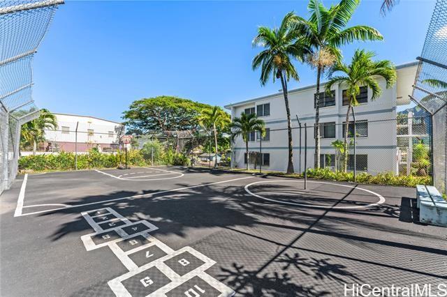 45-535 Luluku Road, Unit G1 Kaneohe, HI 96744 - Photo 15 of 15 a front view of a building with tree s