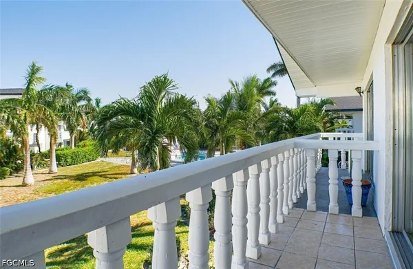 a view of a balcony with lake view