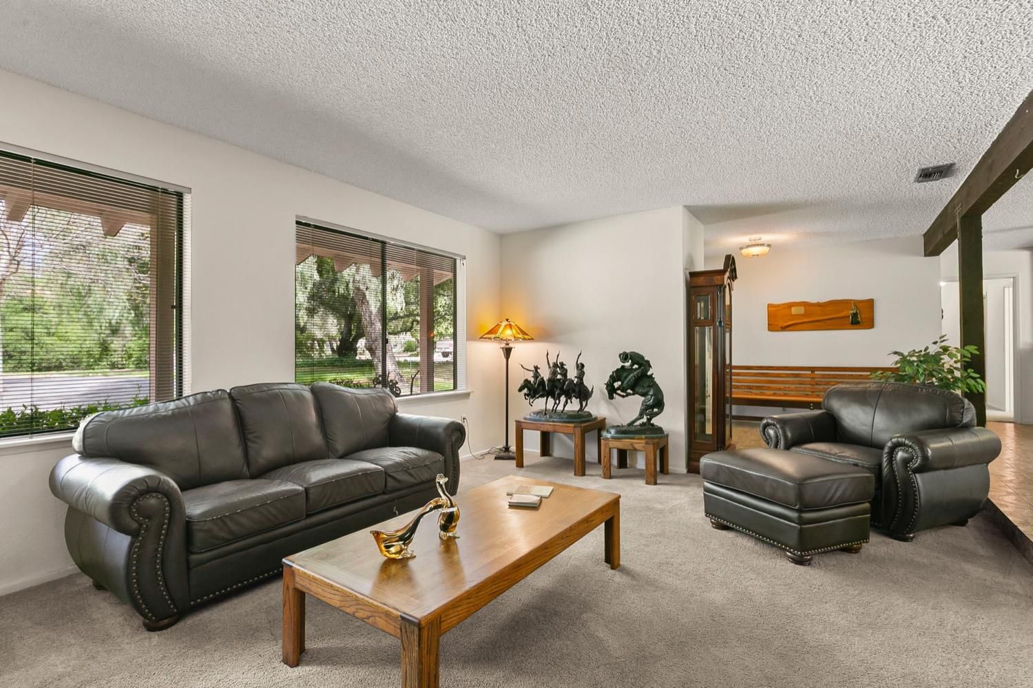 218 Sierra Road Ojai, CA 93023 - Photo 11 of 50 a living room with furniture and a large window