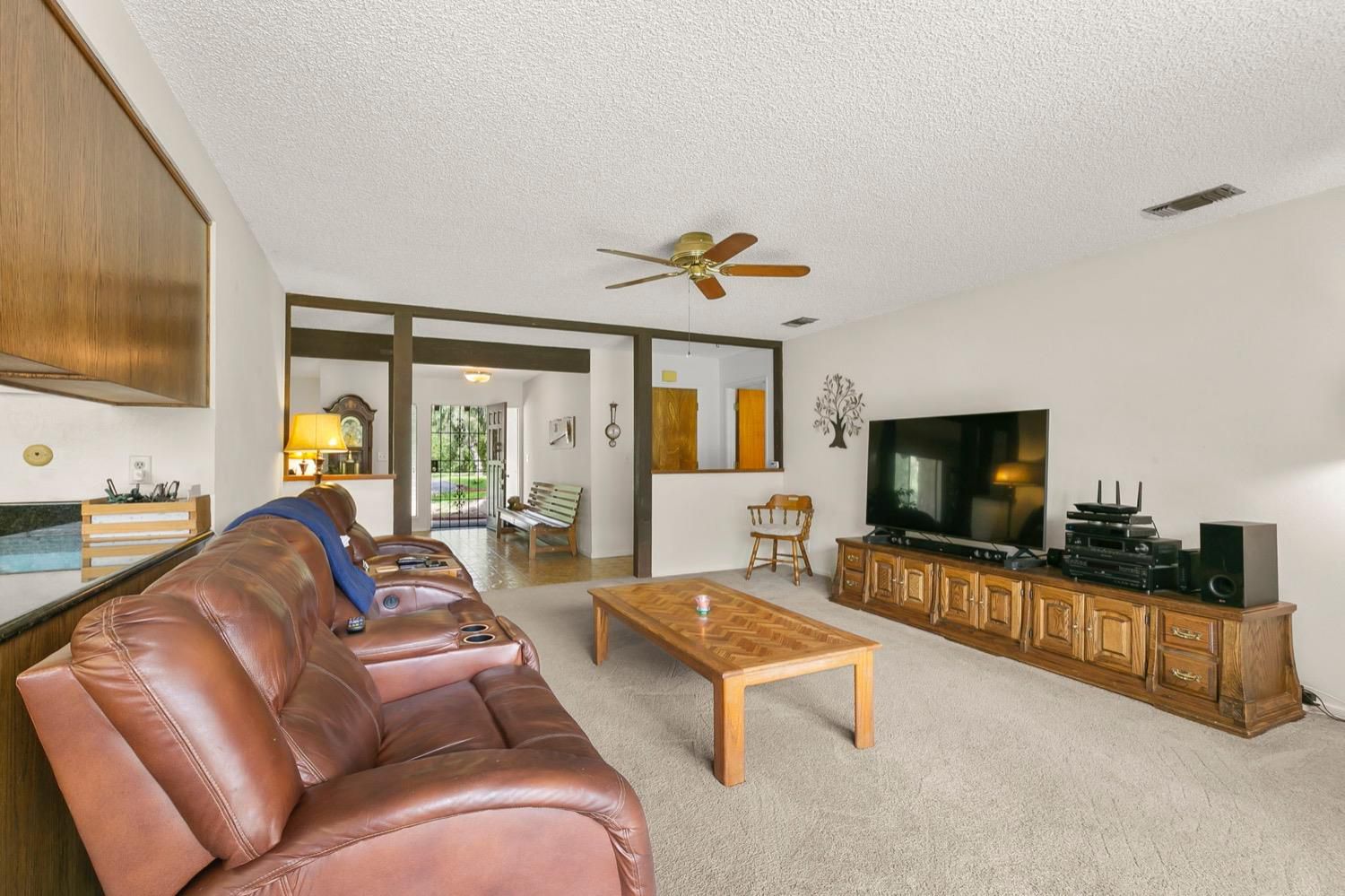 218 Sierra Road Ojai, CA 93023 - Photo 18 of 50 a living room with furniture and a flat screen tv