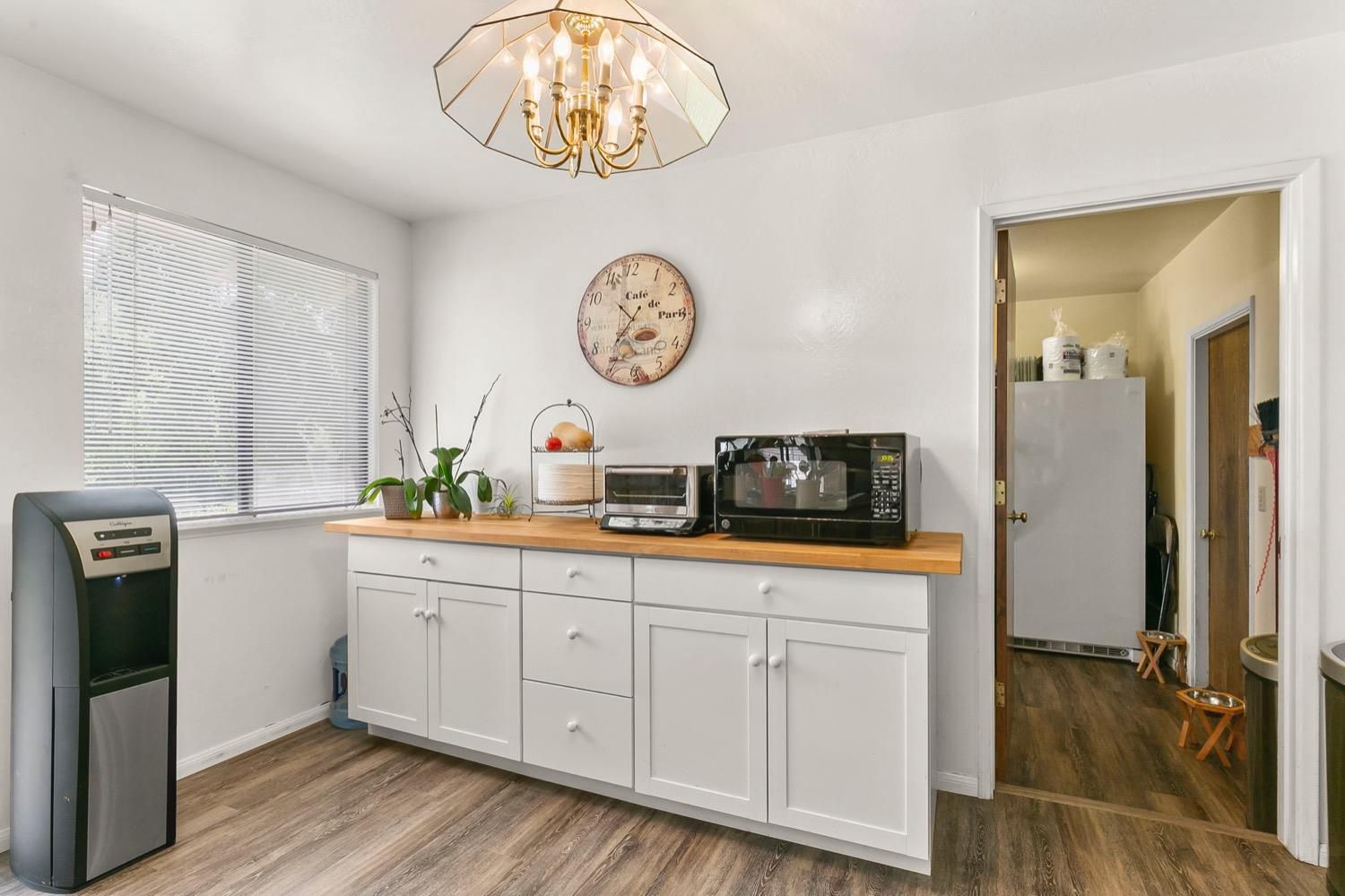 218 Sierra Road Ojai, CA 93023 - Photo 23 of 50 a kitchen with a sink cabinets and wooden floor