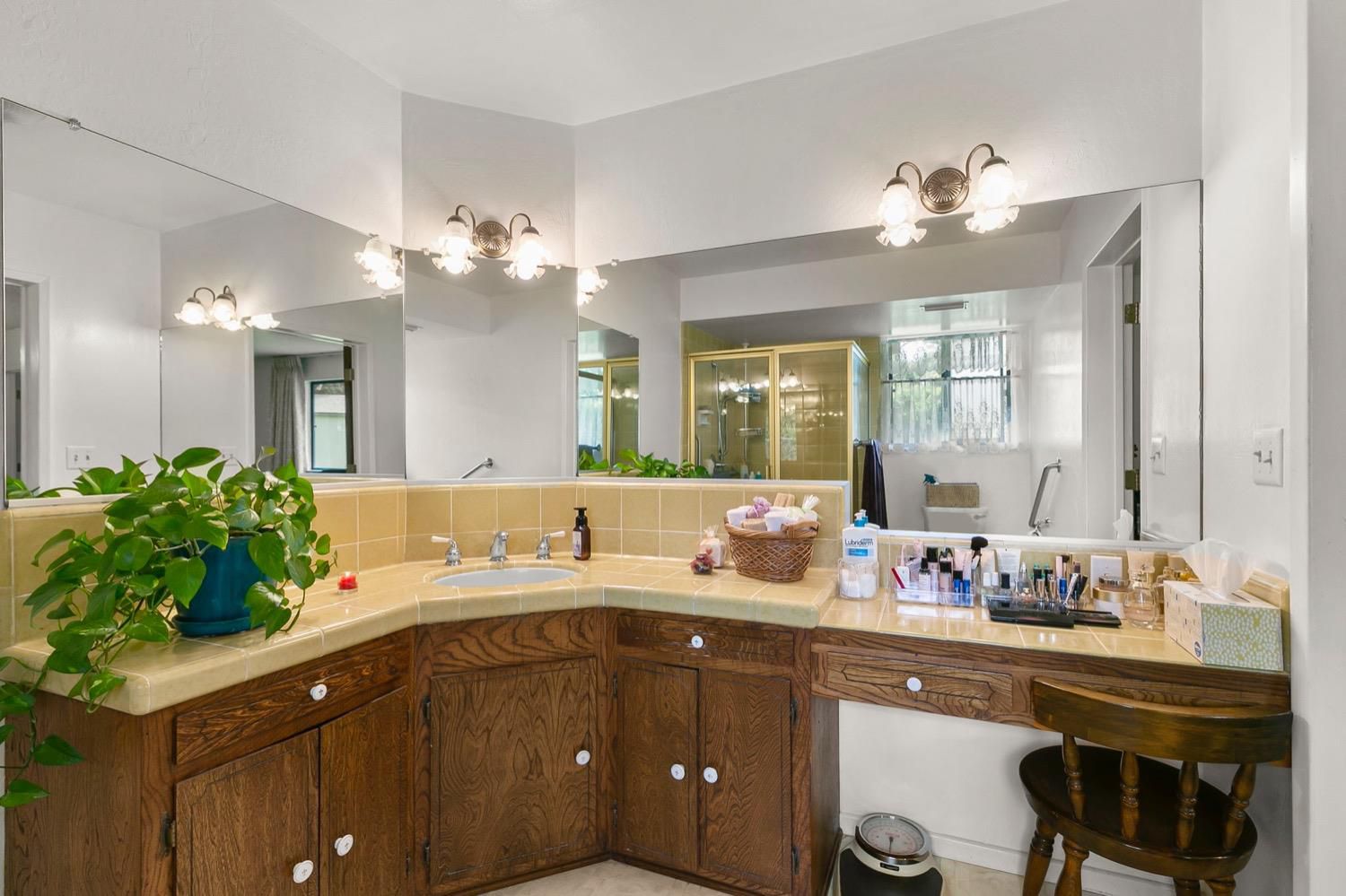 218 Sierra Road Ojai, CA 93023 - Photo 27 of 50 a spacious bathroom with a sink double vanity and a mirror