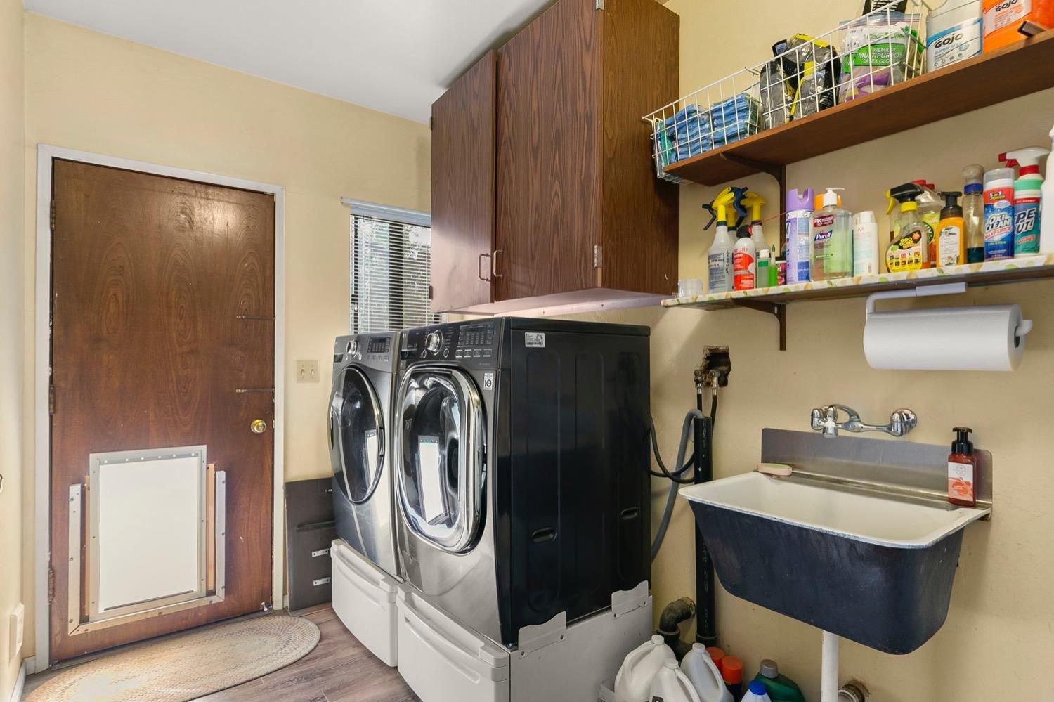 218 Sierra Road Ojai, CA 93023 - Photo 32 of 50 a utility room with dryer and washer