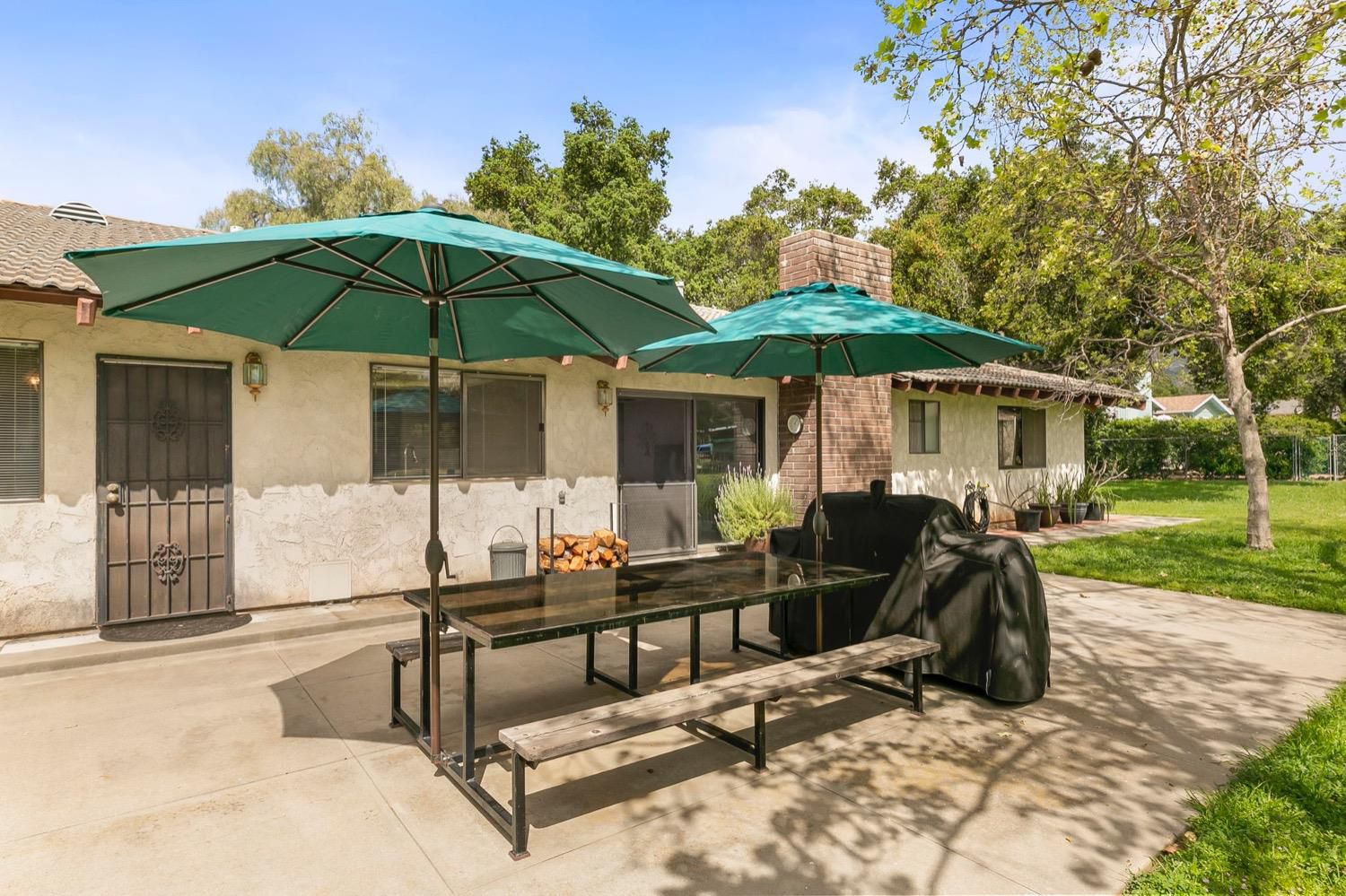 218 Sierra Road Ojai, CA 93023 - Photo 35 of 50 a view of a house with backyard sitting area and garden