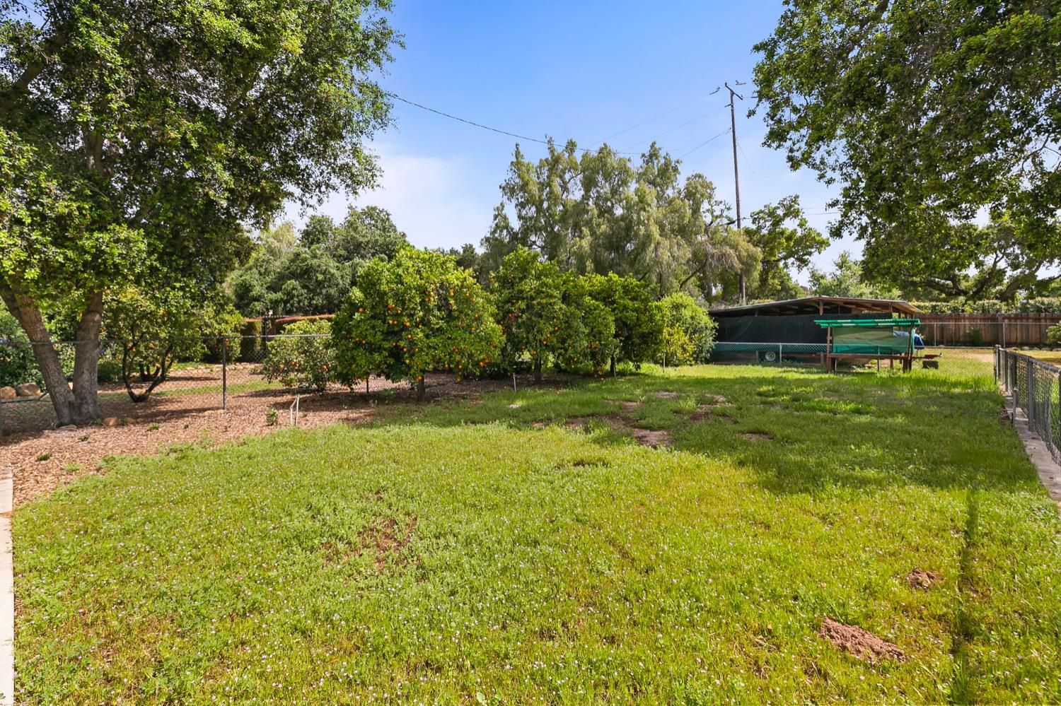 218 Sierra Road Ojai, CA 93023 - Photo 43 of 50 a swimming pool with wooden fence
