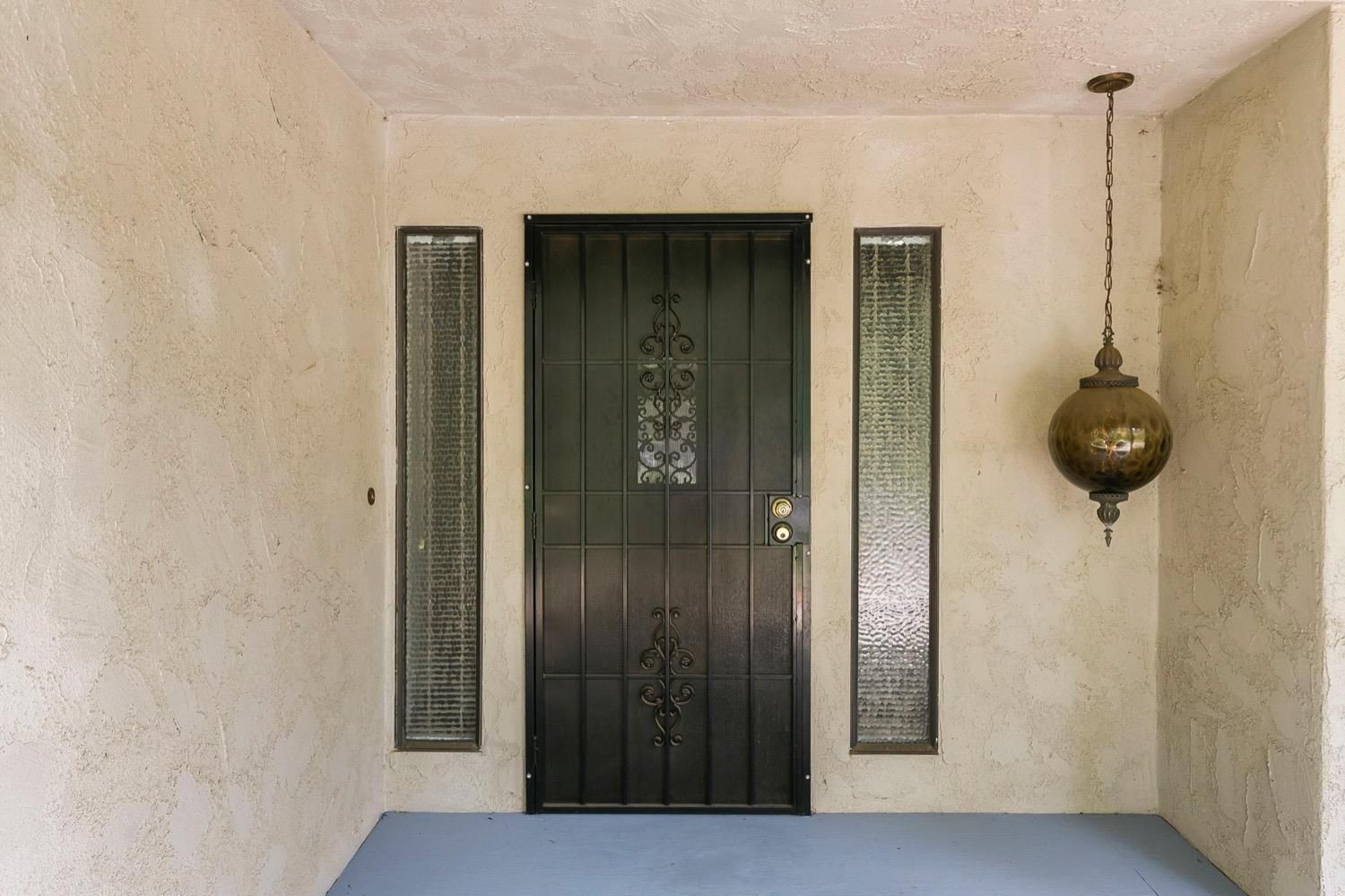 218 Sierra Road Ojai, CA 93023 - Photo 7 of 50 a view of a hallway with a wooden cabinets